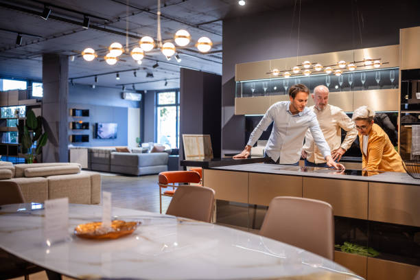 istock Discussing modern kitchen design in elegant showroom space 2191396750