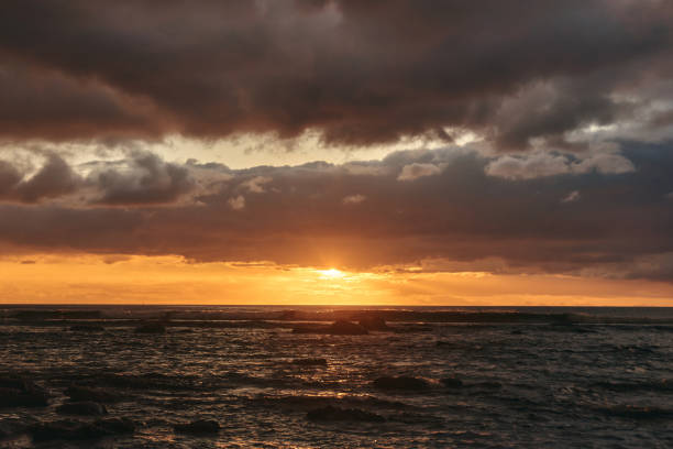 istock Gorgeous sunset with rain and clouds as a cyclone passes through Mauritius Island 2191397150