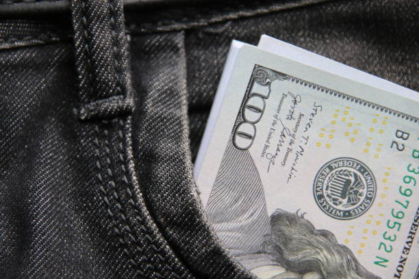 istock Dollars in a jeans pocket concept, 2191397188