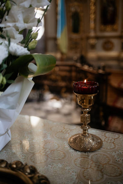 istock Lit Candle in Church 2191398300