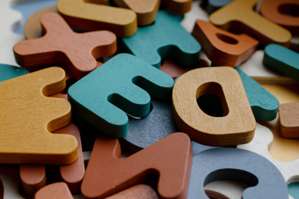 istock wooden educational letters, scattered letters create a background 2191398455