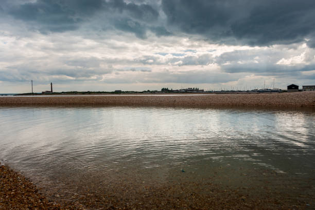 Green weed and mud at Pin Mill, a small hamlet on the south bank of the River Orwell near Chelmondiston on the Shotley Peninsula in south-east Suffolk, Eastern England. It is popular with tourists and the sailing community.