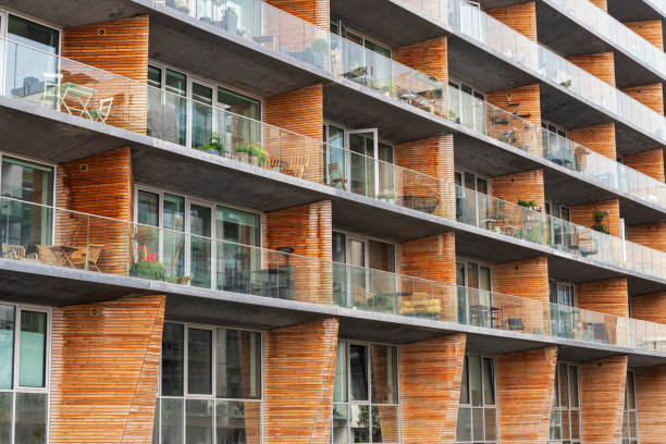 Modern futuristic facade, made of wood and glass, of a residential apartment building in Aahrus, Jutland, Denmark
