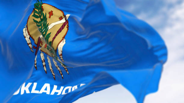 istock Close-up of Oklahoma state flag waving on a clear day 2191402608