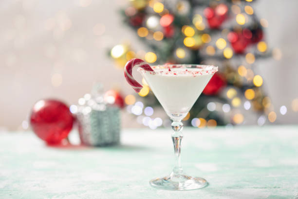 istock White chocolate  martini cocktail with candy cane. Christmas drink 2191403021