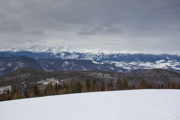 istock Snow-Capped Mountain Peak with Breckenridge Slopes in the Background 2191404673