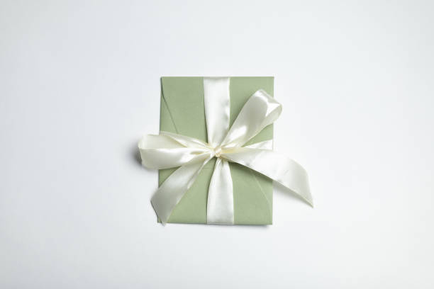 istock soft green certificate with a milky bow, gift certificate, voucher 2191406080