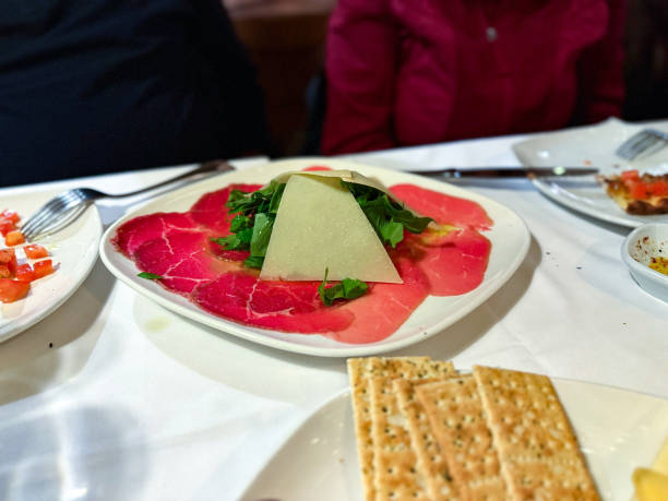 istock Beef carpaccio with arugula, parmesan cheese. 2191407433