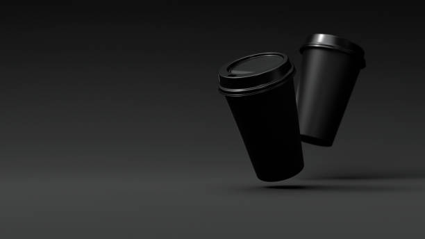 istock Two Minimalist Black Blank Paper Coffee Cup floating above black background. Takeaway paper coffee cup fly, 3d render illustration 2191407957