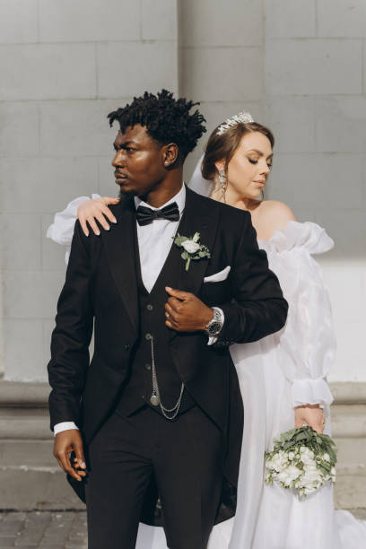 istock Elegant interracial couple posing during their wedding day 2191409876