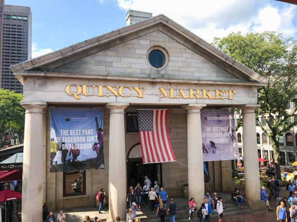 Boston, Massachusetts, USA- September 29, 2918: Quincy Market exterior facade building view to the famous retail and restaurant complex at Faneuil Hall Marketplace travel destination