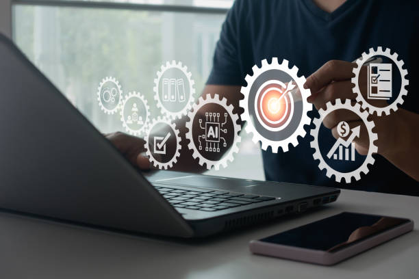istock Businessman using laptop computer in an office. Business planning concept, business processes and workflow, problem solving, quality control, long-term business evaluation tracking with Ai technology. 2191410359