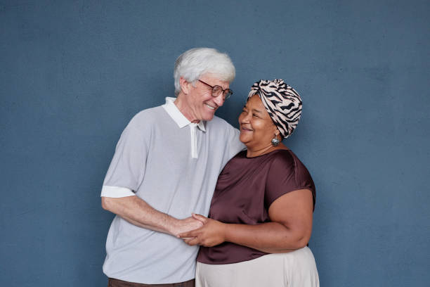 istock Multiethnic Senior Couple on Blue 2191411235