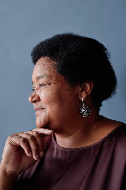 istock Senior African American Woman Profile on Blue 2191411252