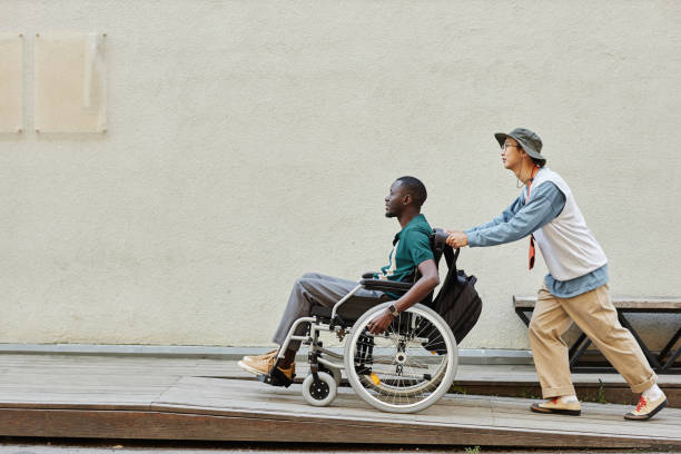 istock Black Man using Wheelchair on Ramp 2191411467