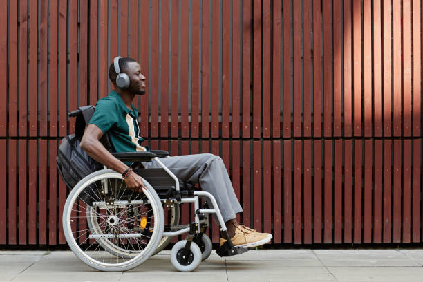 istock Modern Man with Disability Listening to Music 2191411528