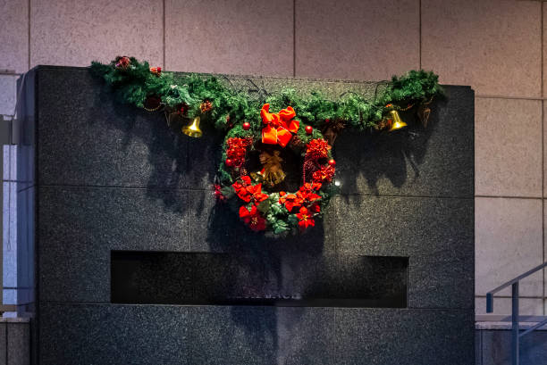 istock Christmas wreath hanging on the wall 2191412645