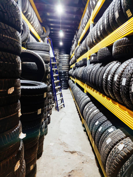 istock Stack of tires for sale in warehouse 2191413653