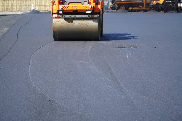 istock close up on compactor roller paving the asphalt road 2191414394