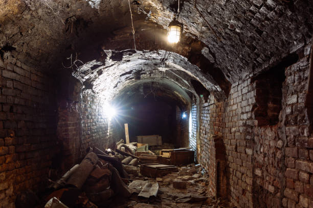 istock Red brick underground tunnel under old fortress 2191414678