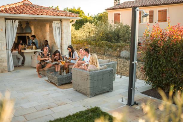 istock Diverse Friends Enjoying a Poolside Feast 2191420658