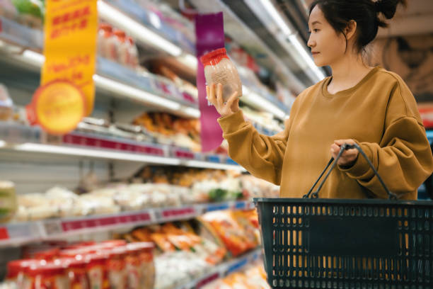 istock Woman Shoppers Exploring Aisles In a Modern Grocery Store 2191424123