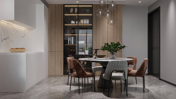 istock An elegant dining room features a round table, modern chairs, and a statement chandelier. 2191428878