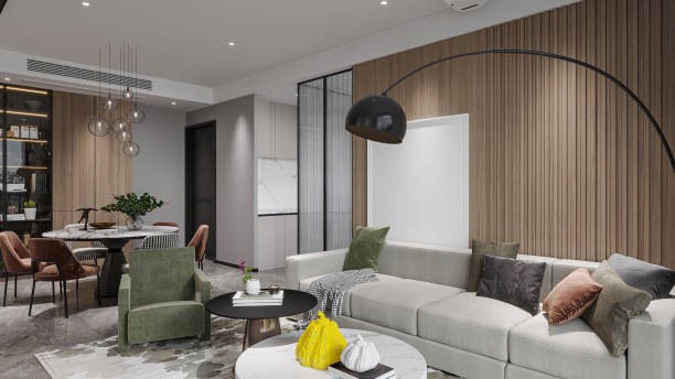 istock Contemporary minimalist living room interior featuring a wood texture wall, gray sofas, and a marble coffee table. 2191428888