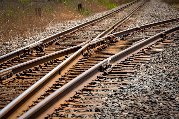 istock Railroad  track Switch Direction and Merge into shipping customer spurs 2191429991