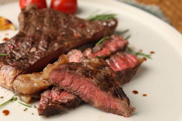 istock Delicious grilled beef steak on plate, closeup 2191433718