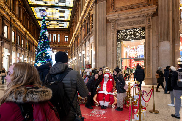 Rome, Italy - December 23, 2024: Galleria Alberto Sordi, before the Hamleys' shop people in line are waiting to have their picture taken with Santa Claus.