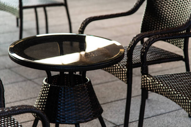 istock tables, chairs and benches in the park 2191438519