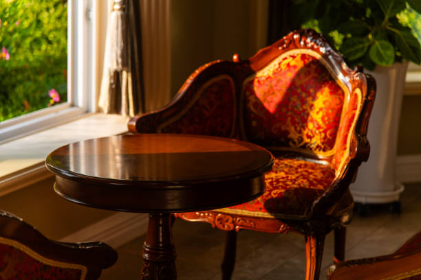 istock old wooden table and chairs by the window 2191438575