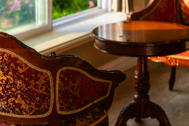 istock old wooden table and chairs by the window 2191438579