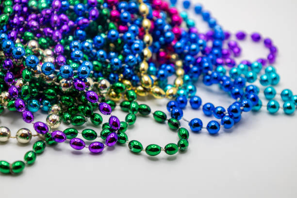 Bunches of Mardi Gras beads for sale in a store.