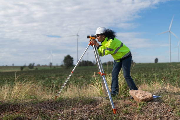 Mini prism for use in surveying, fixed element to monitor distance movements.