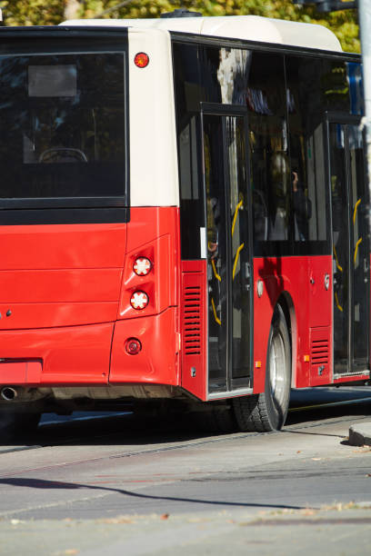 istock Red bus for public transportation on city streets. 2191445512