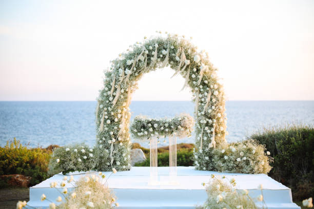 istock Beautiful wedding arch on the beach 2191452780