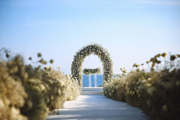 istock Beautiful wedding arch on the beach 2191453025