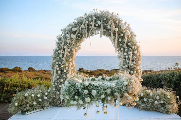 istock Beautiful wedding arch on the beach 2191453115