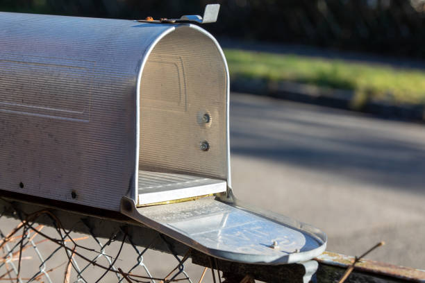 Male human hand getting the mail