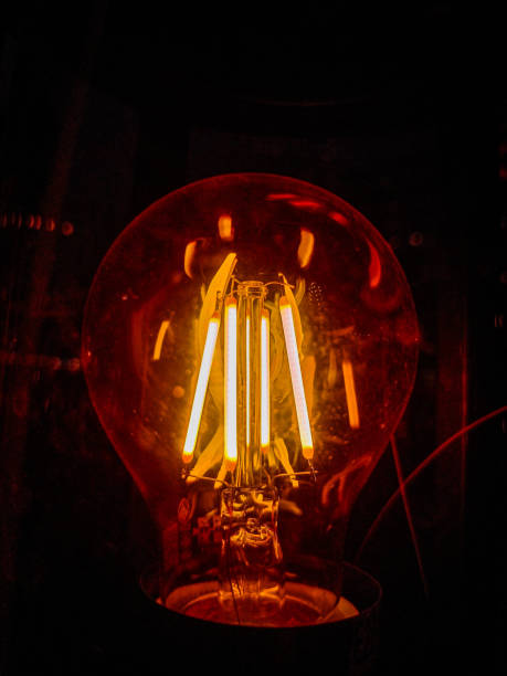 istock Each bulb casts a warm, inviting glow that contrasts with the surrounding darkness. 2191454632