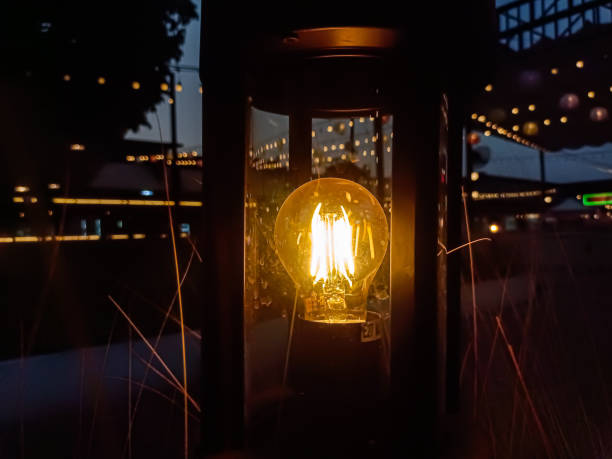 istock Each bulb casts a warm, inviting glow that contrasts with the surrounding darkness. 2191454646