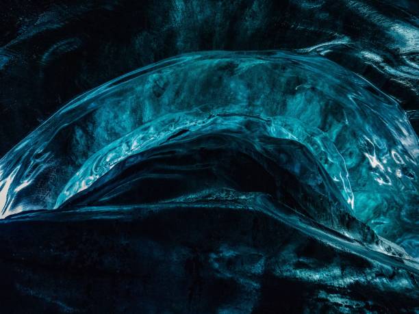 istock Abstract view of a blue ice cave interior showcasing intricate textures and patterns. 2191455912