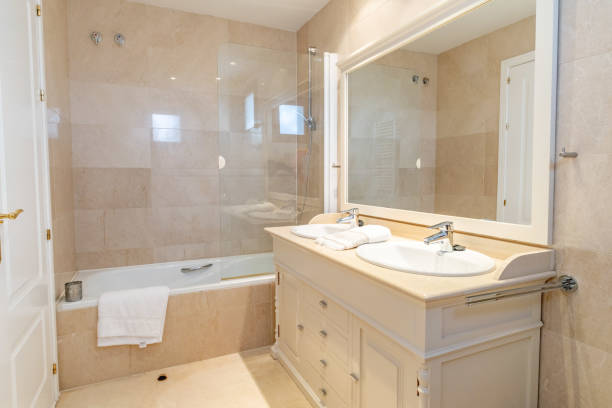 istock Twin bathroom complete with bath in Mediterranean apartment 2191458378
