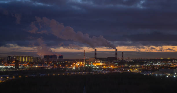 istock Evening Industry: Smoky Silhouettes in the Twilight Glow 2191458584