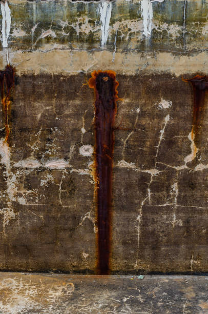 istock Texture of rust on weathered concrete structure with worn and weathered surface 2191461102