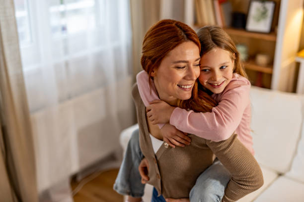 istock Mother and Daughter Sharing a Warm Bond in a Cozy Home Setting 2191462217