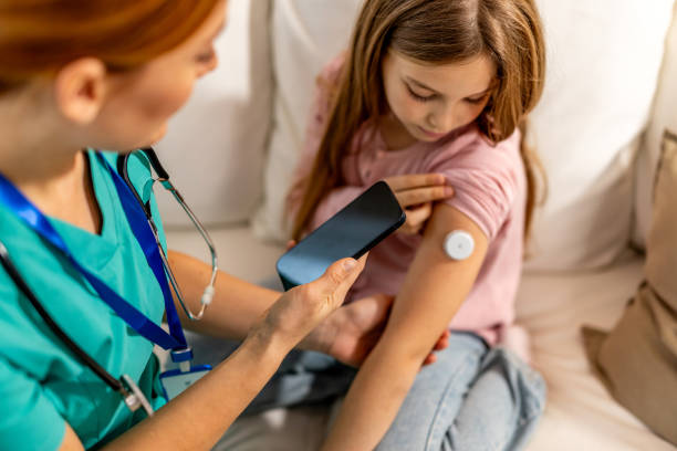istock Pediatric Check-Up Using Digital Health Technology for Patient Monitoring 2191463773