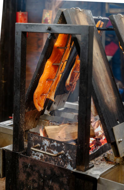 istock Traditional Flame-Cooked Salmon with Rustic Charm – A Nordic Culinary Heritage 2191467228